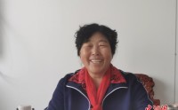 特写：疲惫与兴奋相互交替的殷玉珍
